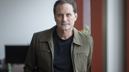 Playwright and screenwriter Zayd Ayers Dohrn stands in the Chicago Public Media offices at Navy Pier Aug. 11, 2026, after a conversation about his new nonfiction book "Dangerous, Dirty, Violent & Young."