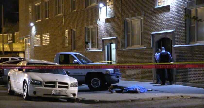 Chicago Police launch an investigation after a man was shot to death in front of a Marquette Park apartment building. | Network Video Productions