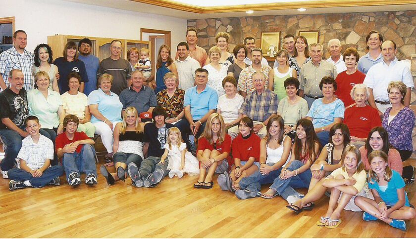 Konnie Pieczykolan of Munster helped connect relatives in many countries. Here he is (plaid shirt, second row right) at a family reunion in Indiana. | Family photo