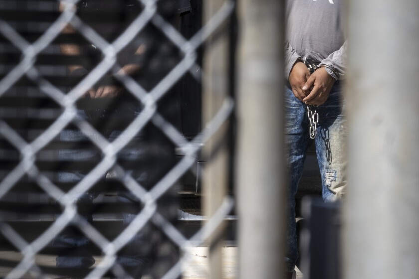 Immigration and Customs Enforcement officers escort detainees into the ICE facility in Broadview, Wednesday, Sept. 17, 2025. | Ashlee Rezin/Sun-Times