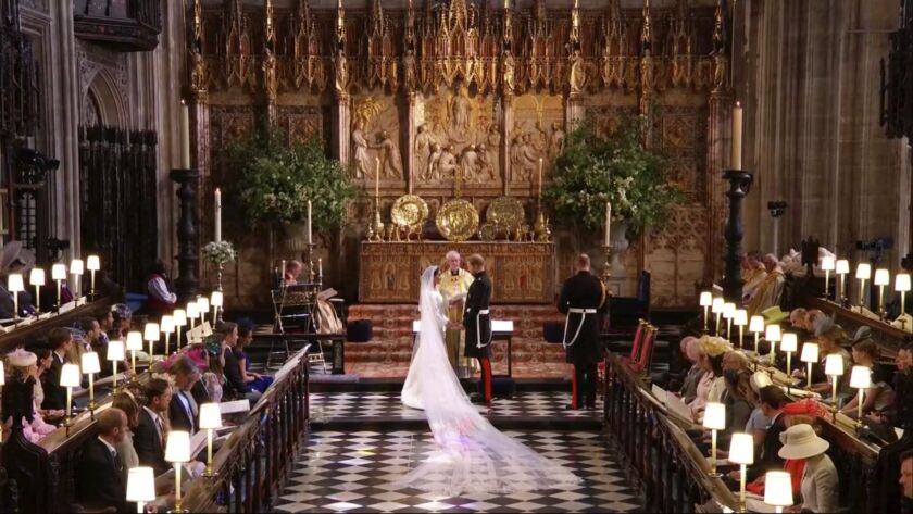 In this frame from video, Britain’s Prince Harry and Meghan Markle exchange their vows during their wedding ceremony at St. George’s Chapel in Windsor Castle in Windsor, near London, England, Saturday, May 19, 2018. (UK Pool/Sky News via AP)