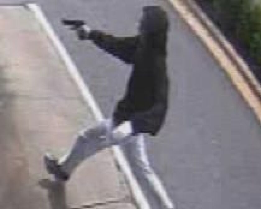 Surveillance image of a suspect in an ATM robbery June 28 outside a Chase Bank at 1783 River Oaks Drive in Calumet Heights. | FBI
