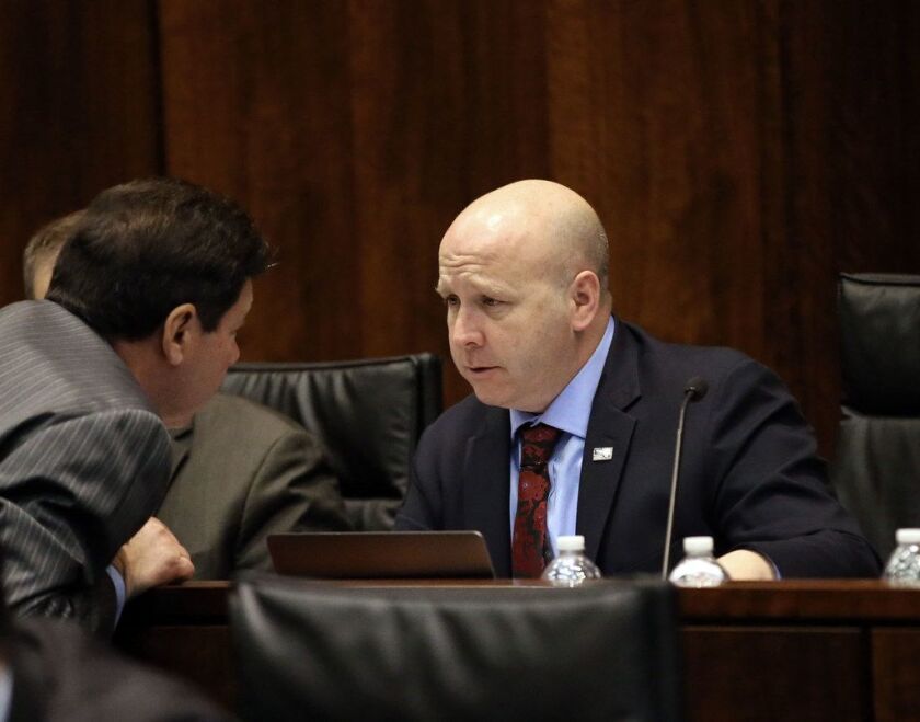 State Sen. Tom Cullerton confers with other members of the House and Senate Veterans Affairs committee in Chicago Tuesday, January 9, 2017. | Kevin Tanaka/For the Sun Times