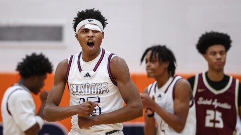 Curie’s Kendall Holliday (15) reacts during the game against St. Ignatius during the Merry Madness Holiday Shootout at Young.