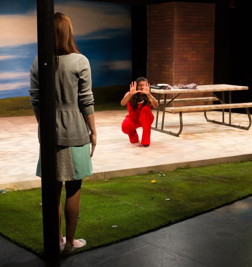 Abigail Pierce (left) and Ginneh Thomas in the Strawdog Theatre production of Robert O’Hara’s “Barbecue.” | Heath Hays