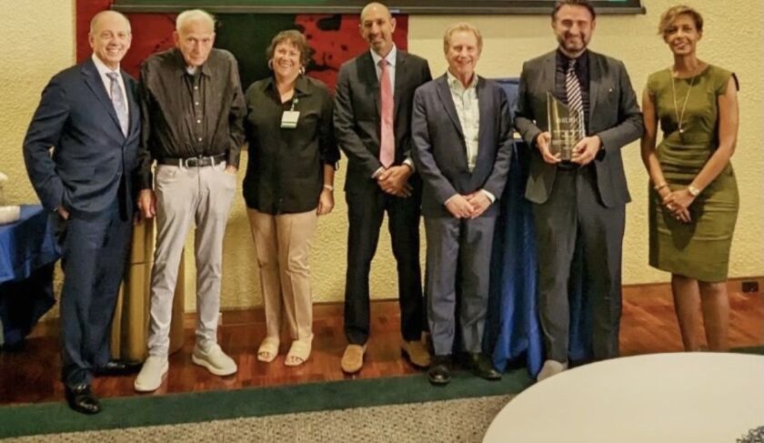 From left: Interim Rush University President Dr. Larry Goodman; Dr. Stuart Levin; Rush interim dean of medicine Dr. Cynthia Brincat; Rush President and CEO Dr. Omar Lateef; Dr. Thomas Deutsch; Dr. Jochen Reiser; Rush interim chair of medicine Dr. Monnie Wasse. The photo was taken at Reiser’s farewell ceremony in August. Reiser is now president of the University of Texas Medical Branch.