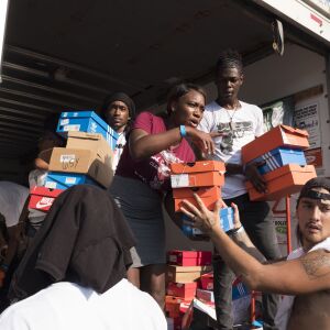 Save Money Save Lives handed out free shoes. | Rick Majewski/For the Sun-Times