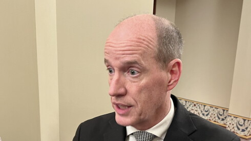 State Sen. Bill Cunningham, D-Chicago, speaks to reporters at the Illinois Capitol late Sunday.