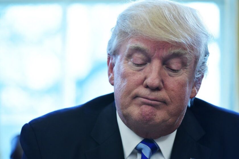 President Donald Trump pauses as he speaks from the Oval Office of the White House in Washington, DC, on March 24, 2017. / AFP PHOTO / MANDEL NGANMANDEL NGAN/AFP/Getty Images