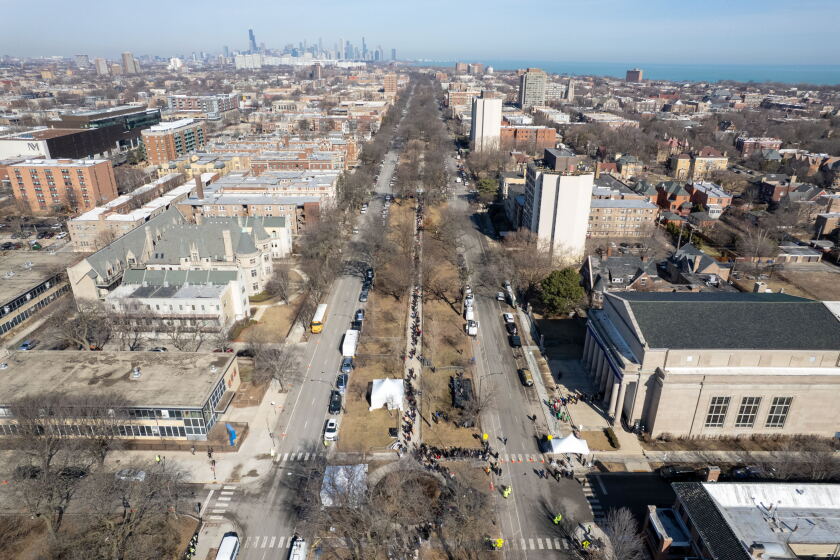 An aerial view shows hundreds of people lined up along Dreel Blvd. from 50th street to 49th street Friday outside Rainbow Push’s headquarters in Kenwood to pay their respects to Rev. Jesse L. Jackson, who died Feb. 17.