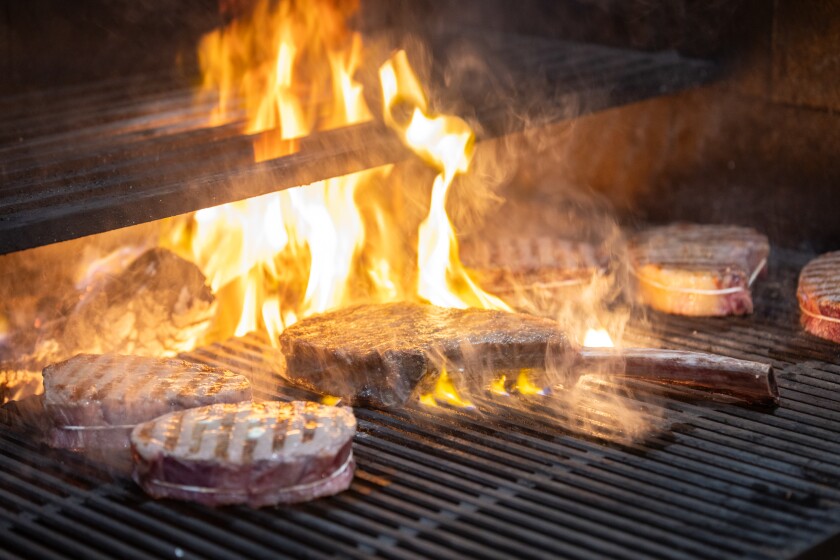 An Australian Wagyu Tomahawk 42oz Ribeye, cooked over a charcoal fire at the Alston.
