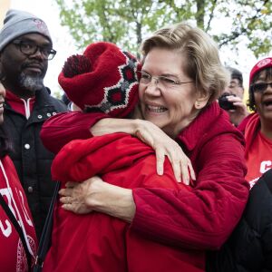 Presidential candidate U.S. Sen. Elizabeth Warren (D-MA) hug supporters as she joins striking Chicago Teachers Union and SEIU Local 73 members for a speech on the picket line outside Oscar DePriest Elementary School.