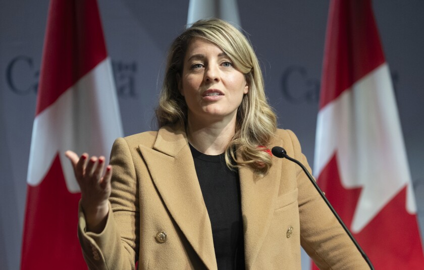 Canadian authorities officers meet with Trump's nominee for commerce secretary in bid to keep away from tariffs 1 FILE - Canada's Minister of Foreign Affairs Melanie Joly responds to a question during a news conference in Ottawa, Nov. 1, 2024. (Adrian Wyld/The Canadian Press via AP, File)