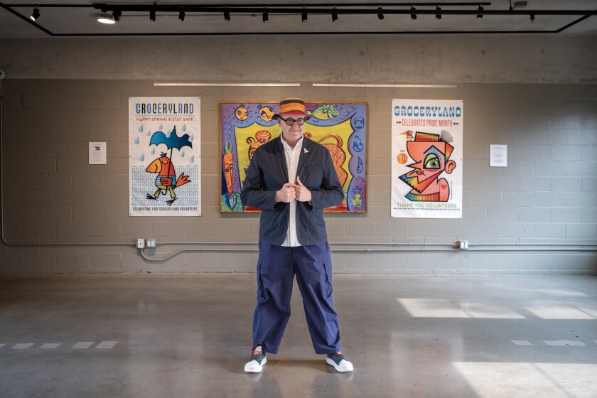 Artist David Lee Csicsko stands for a portrait among his art work the is displayed at Epiphany Center for the Arts on Thursday June 20, 2024. | Jim Vondruska/For the Sun-Times