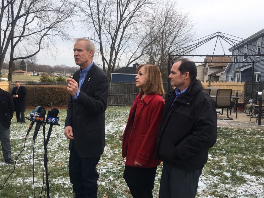Gov. Bruce Rauner calling for the resignation of Cook County Assessor Joe Berrios while in the backyard of the Wheeling home of Marianne Murphy — a Rauner appointee to the Illinois Health Facilities and Services Review Board on Dec. 11, 2017. | Tina Sfond