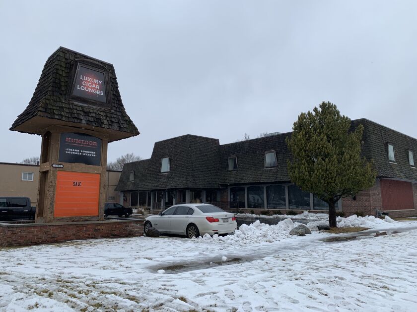A Hyde Park women opened fire on three state troopers, killing one, before fatally shooting herself late Friday at the Humidor, located at 1600 Ogden Ave. in Lisle.