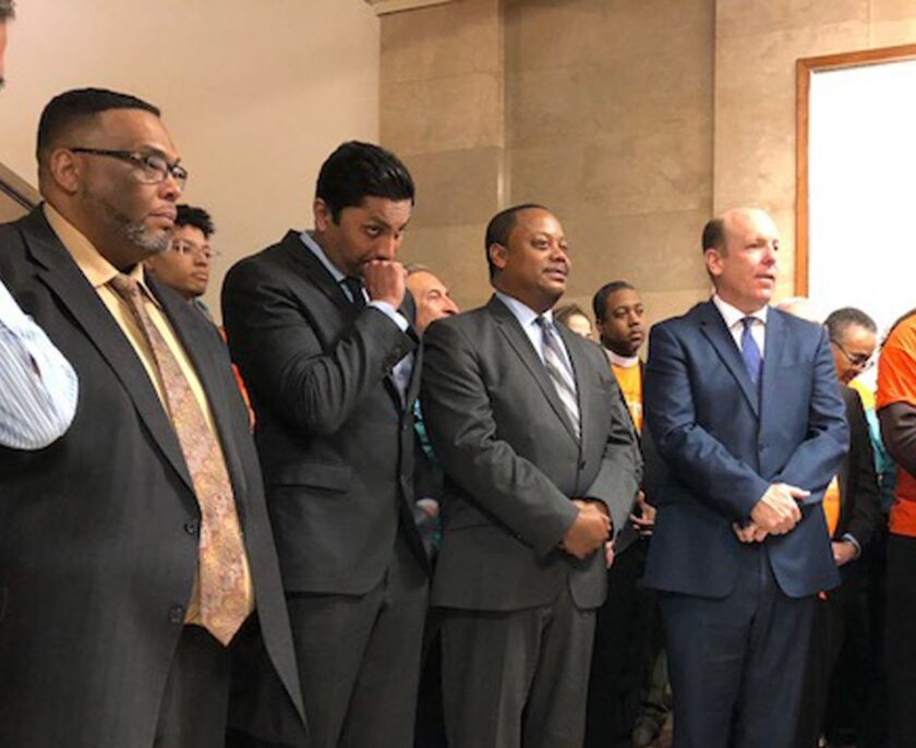 Aldermen (from left) Chris Taliaferro (29th), Ameya Pawar (47th), Roderick Sawyer (6th) and Harry Osterman (48th) at Tuesday’s City Hall news conference unveiling a sweeping proposal to empower a seven-member civilian oversight commission to establish pol
