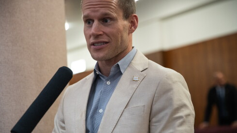 Ald. Timmy Knudsen (43rd) speaks with press after a City Council meeting Wednesday.