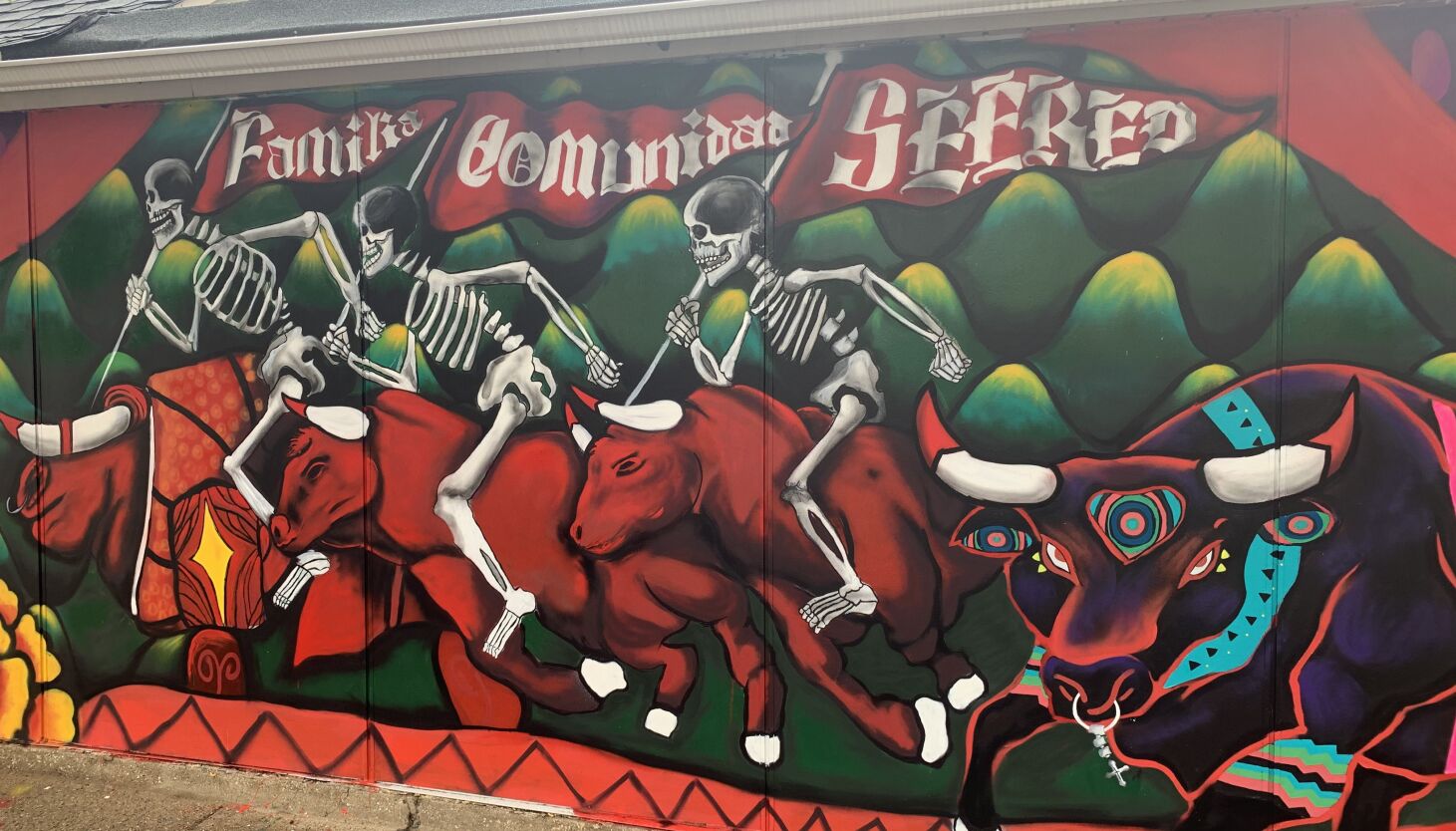 NextImg:In Pilsen mural, skeletons riding stampeding cattle offer a nod to Mexican heritage, the Bulls