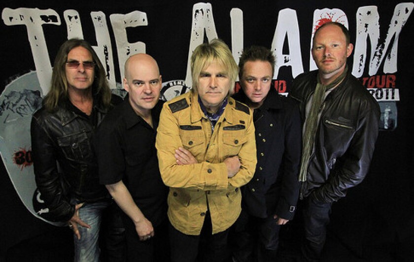 The Alarm: Mark Taylor (from left), Craig Adams, Mike Peters, James Stevenson and Smiley. | THEALARM.COM