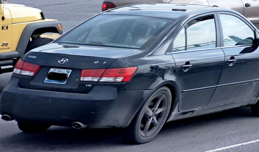 The two robbers drove off in a dark-colored Hyundai Sonata that was driven by a third person, police said. | Mount Prospect police.