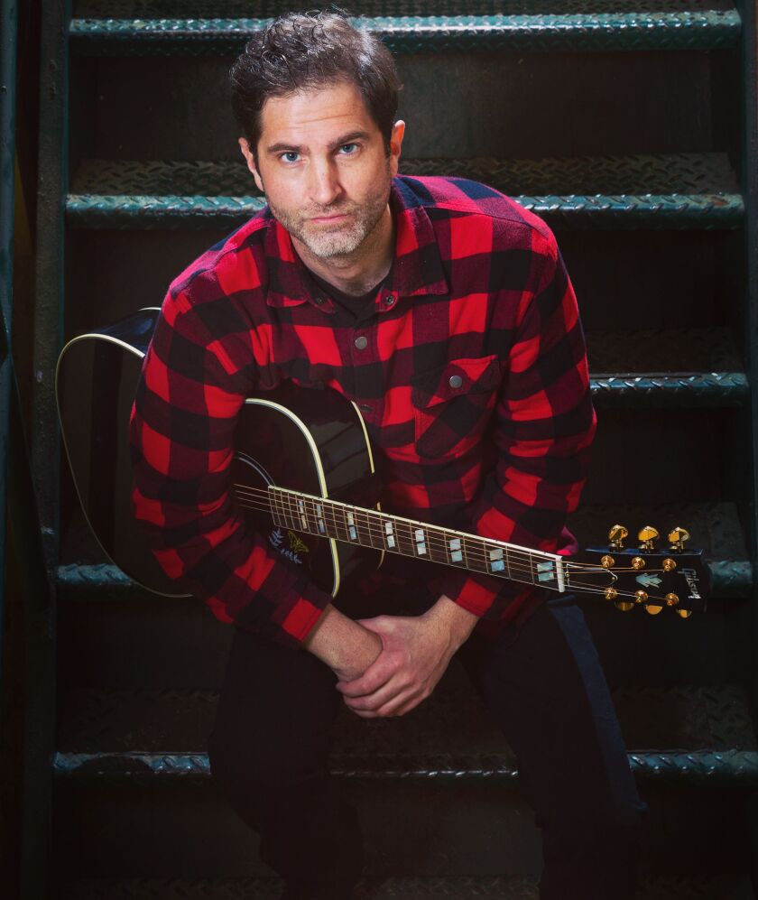 Tyson Manker says playing guitar brought him relief from his PTSD symptoms.