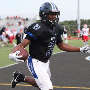 Lincoln-Way East’s Devon Williams (21) reacts after scoring. Allen Cunningham/For the Sun-Times.