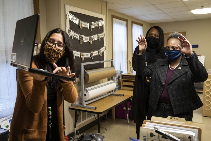 Mayor Lori Lightfoot waves to South Side preschool students learning virtually on Jan. 11, 2021.