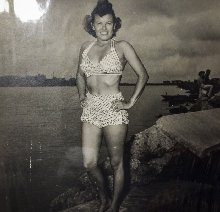 Joan Schechner, 94, still has the bathing suit she took with her when she went off to serve in the Pacific as a nurse in World War II.
