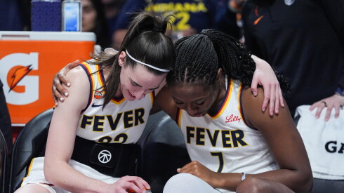 Indiana Fever guard Caitlin Clark and center-forward Aliyah Boston share a moment during a game against the Los Angeles Sparks on Wednesday, May 13, 2026, in Los Angeles.