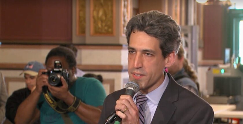 State Sen. Daniel Biss speaks at a rally in Springfield Tuesday. Sun-Times Media.
