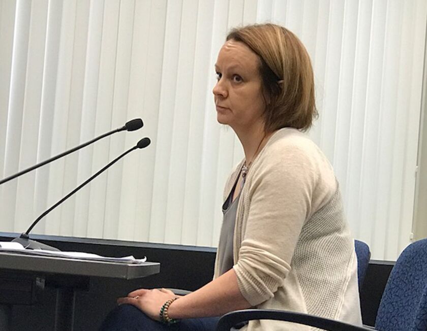 Massage parlor owner Ellen Letton urges aldermen Wednesday to limit the operating hours of massage parlors and ban locked doors. Neither of those provisions is included in the crackdown advances Wednesday. | Fran Spielman/Sun-Times