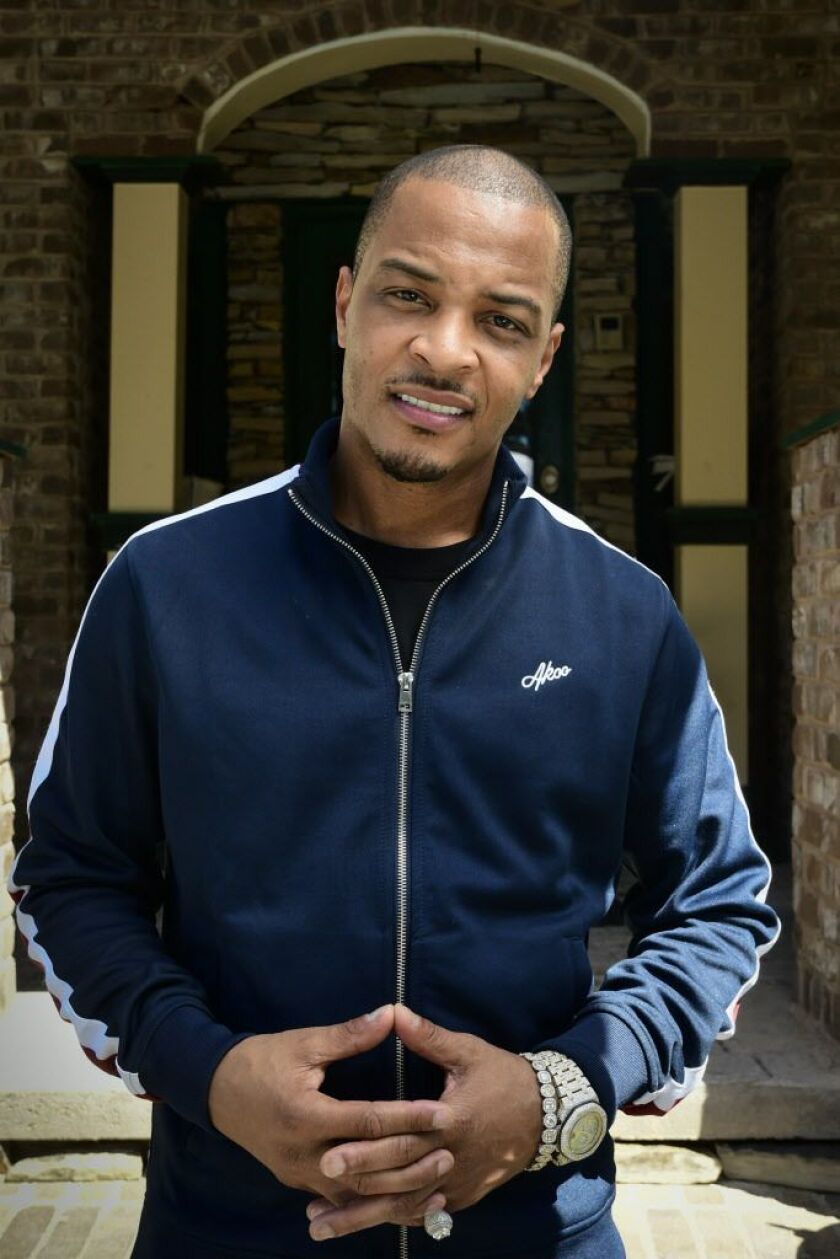 Rapper Clifford Harris Jr., better known as T.I., is paying homage to the trap music culture with its own museum dedicating areas of the exhibit to rappers including himself, Gucci Mane, Jeezy, Rick Ross and Future. | John Amis/AP