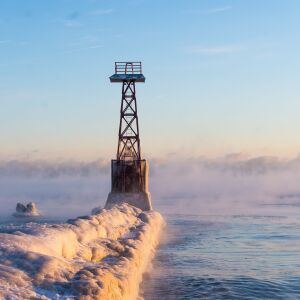 A beacon off of Chicago’s lakefront is frozen over as temperatures drop below 0 degrees, Friday, Jan. 25, 2018, in Chicago. | Tyler LaRiviere/Sun-Times