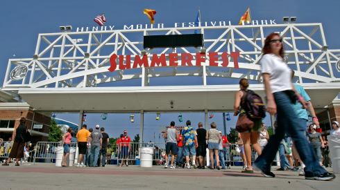 People arrive for the opening day of Summerfest Thursday, June 29, 2006, in Milwaukee. The city's festival grounds lost power Thursday during the opening day of Summerfest in an incident that sent a man to the hospital, police said.