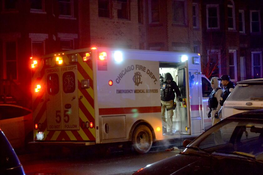 Police investigate after a man who tried to rob a ride-share driver early Thursday shot himself in the hand during a struggle in Park Manor. | Justin Jackson/ Sun-Times