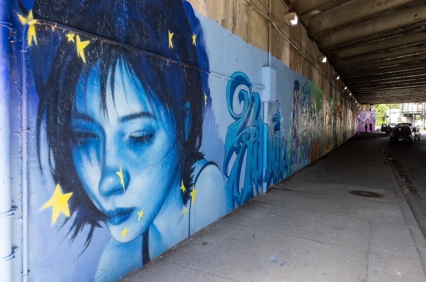 A collaborative 17-artist mural is on an I-90 viaduct near Western Avenue and Logan Boulevard.