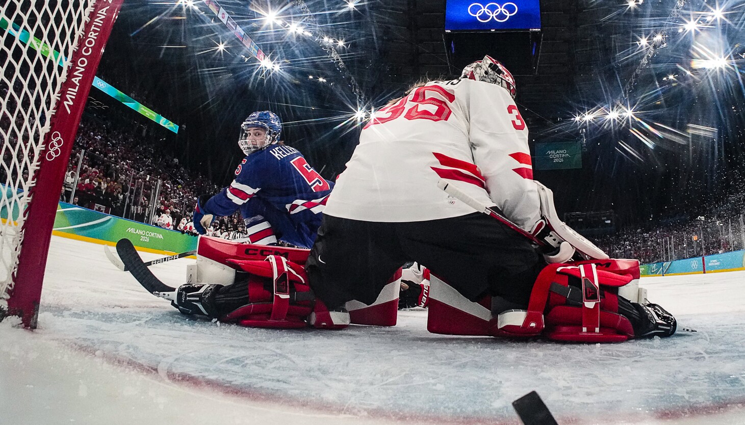U.S. takes gold with 2-1 OT victory over Canada in Olympic women's hockey final