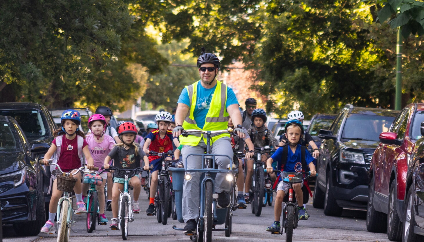 Instead of being driven to school, more kids are taking the ‘bike bus’