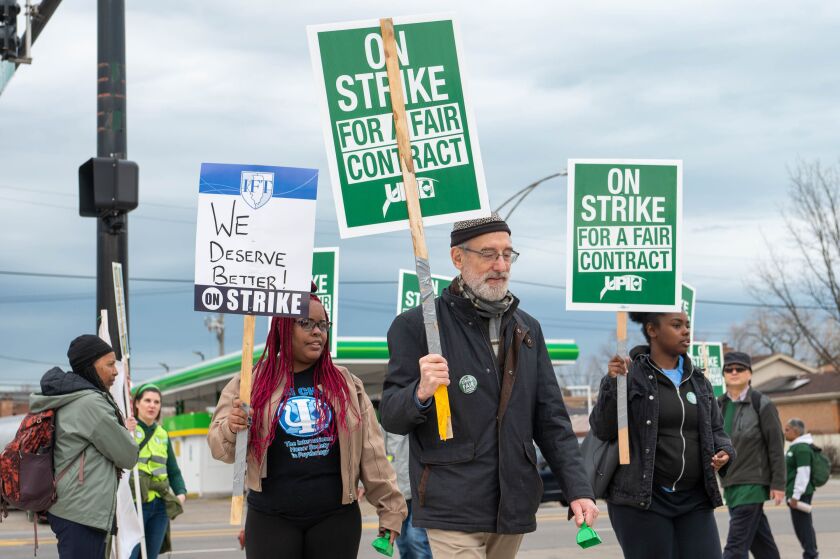 Faculty and staff picket outside Chicago State University during the first day of their strike in April.