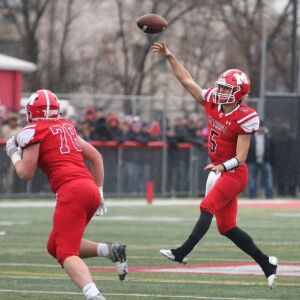 Marist’s Mike Markett (5) throws a pass against Brother Rice, Chicago, llinois, November 17, 2018. | Allen Cunningham / for Chicago Sun-Times