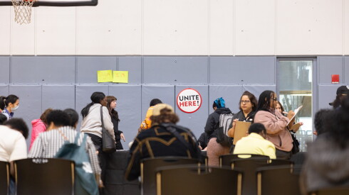 Following a successful strike authorization vote, UNITE HERE Local 1 hotel workers sign up for strike benefits at East-West University in the Loop, Tuesday, Sept. 22, 2026. | Candace Dane Chambers/Sun-Times