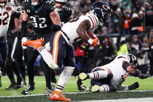 Bears running back Kyle Monangai (25) scores a touchdown during a game against the Philadelphia Eagles on Friday, Nov. 28, 2025, in Philadelphia.