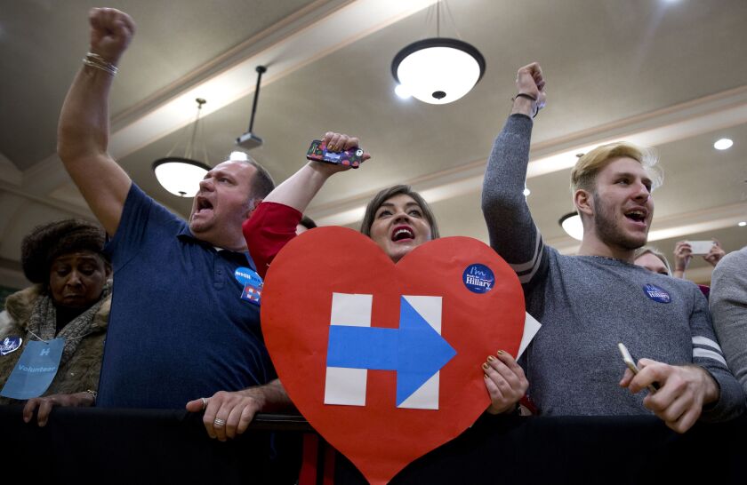 Clinton supporters wear their hearts on their sleeves at her event Monday at Plumbers Hall in Chicago. | Carolyn Kaster/Associated Press