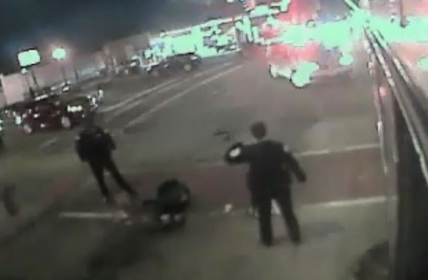 CTA bus surveillance footage shows two police officers standing over a person after a shooting in February 2017. | Independent Police Review Authority