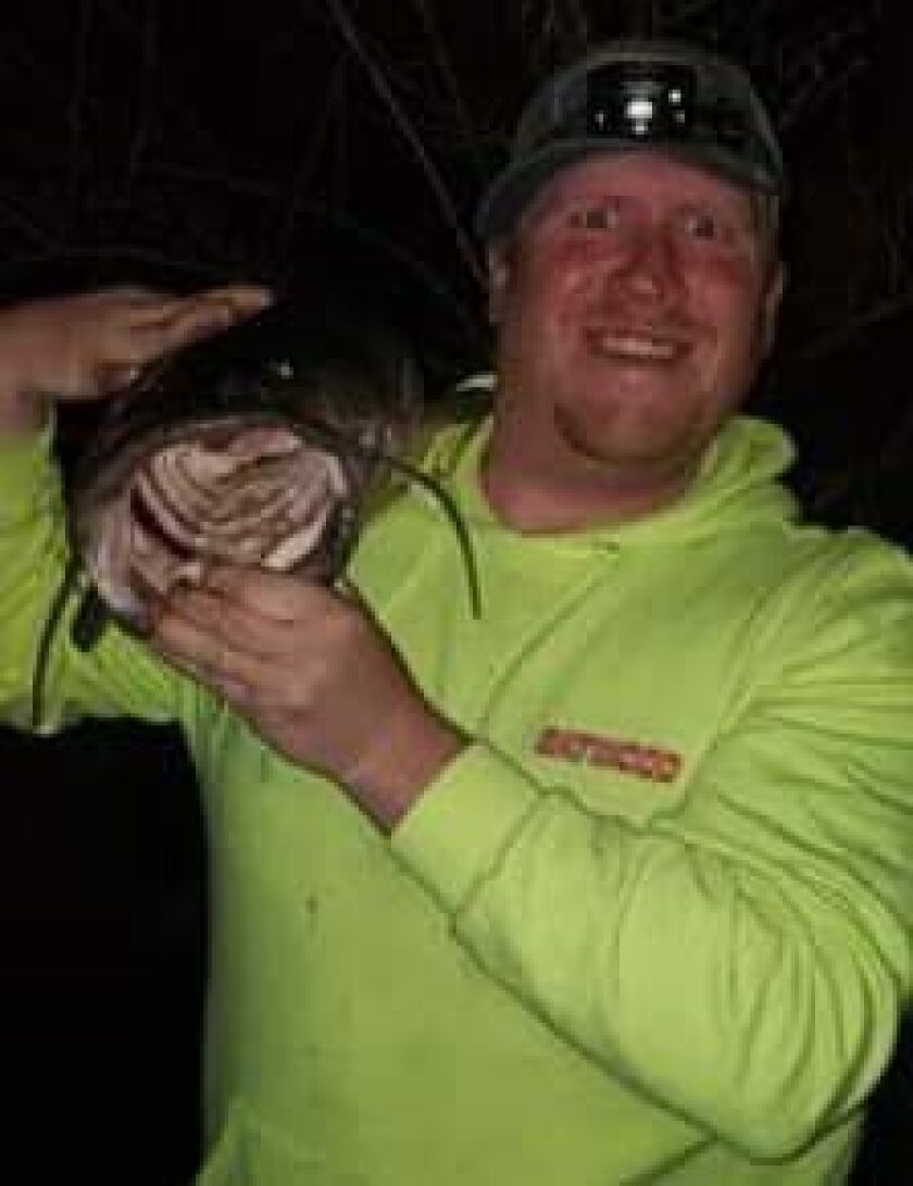 Lucas Miller with the gaping maw shot of his first flathead catfish. Provided photo