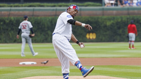 Mr. T throws the ceremonial first pitch during a baseball game between Chicago Cubs and the St. Louis Cardinals at Wrigley Field, Aug. 14, 2026.
