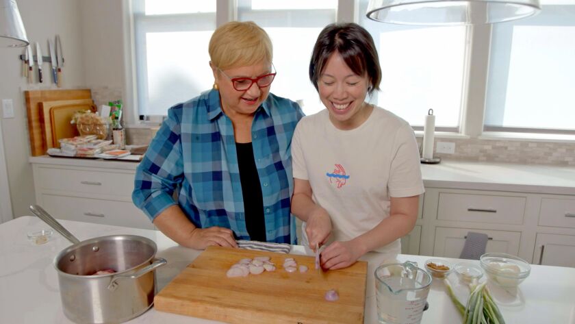 Lidia cooks with chef Christine Ha during a visit to her Houston home in “Lidia Celebrates America: Flavors That Define Us.”