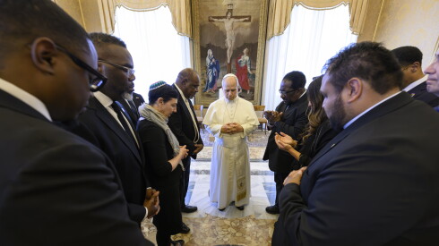 Mayor Brandon Johnson and a delegation of Chicago political and business leaders pray Thursday, May 29, 2026 with Pope Leo XIV at the Vatican.