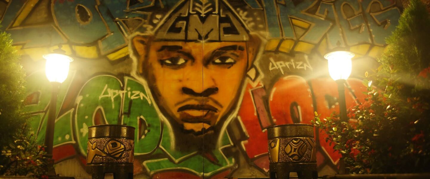 Uprizn Ikpemi worked as an artist in Nigeria before coming to the United States.